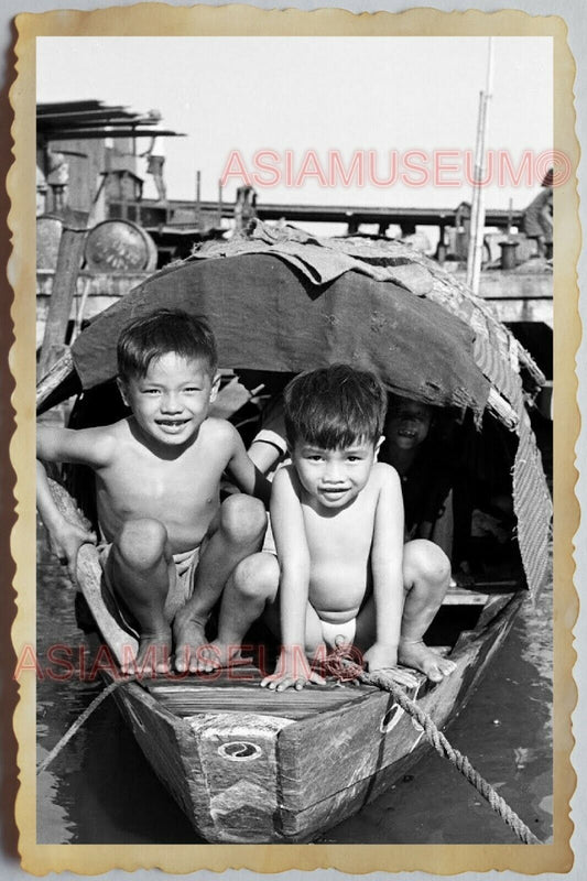 50s Vietnam SAIGON BOY CHILDREN BOAT HOUSE RIVER BANK PIER OLD Vintage Photo 668