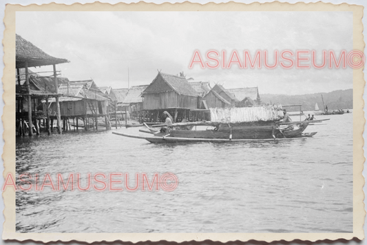 50s PHILIPPINES STILT HOUSE BOAT RIVERFRONT SEASIDE PORT BOY Vintage Photo 29596