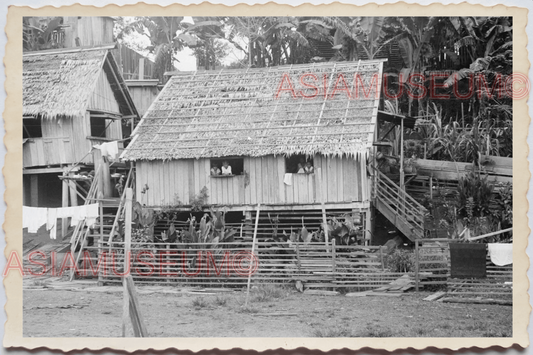 50s PHILIPPINES STILT HOUSE VILLAGE TRIBE COCONUT TREE BOY Vintage Photo 29467