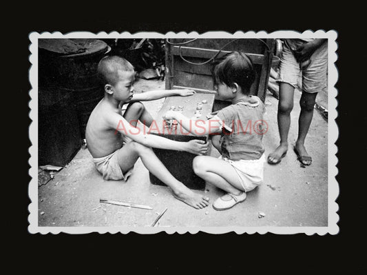 1950s BOY CHILDREN PLAY BOTTLE CAP ALLEY STREET AD Vintage Hong Kong Photo #1397